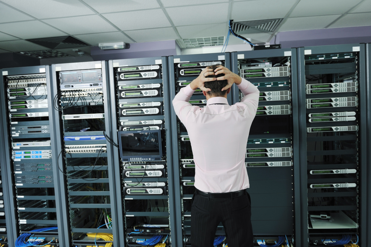 Worried man looking at network infrastructure